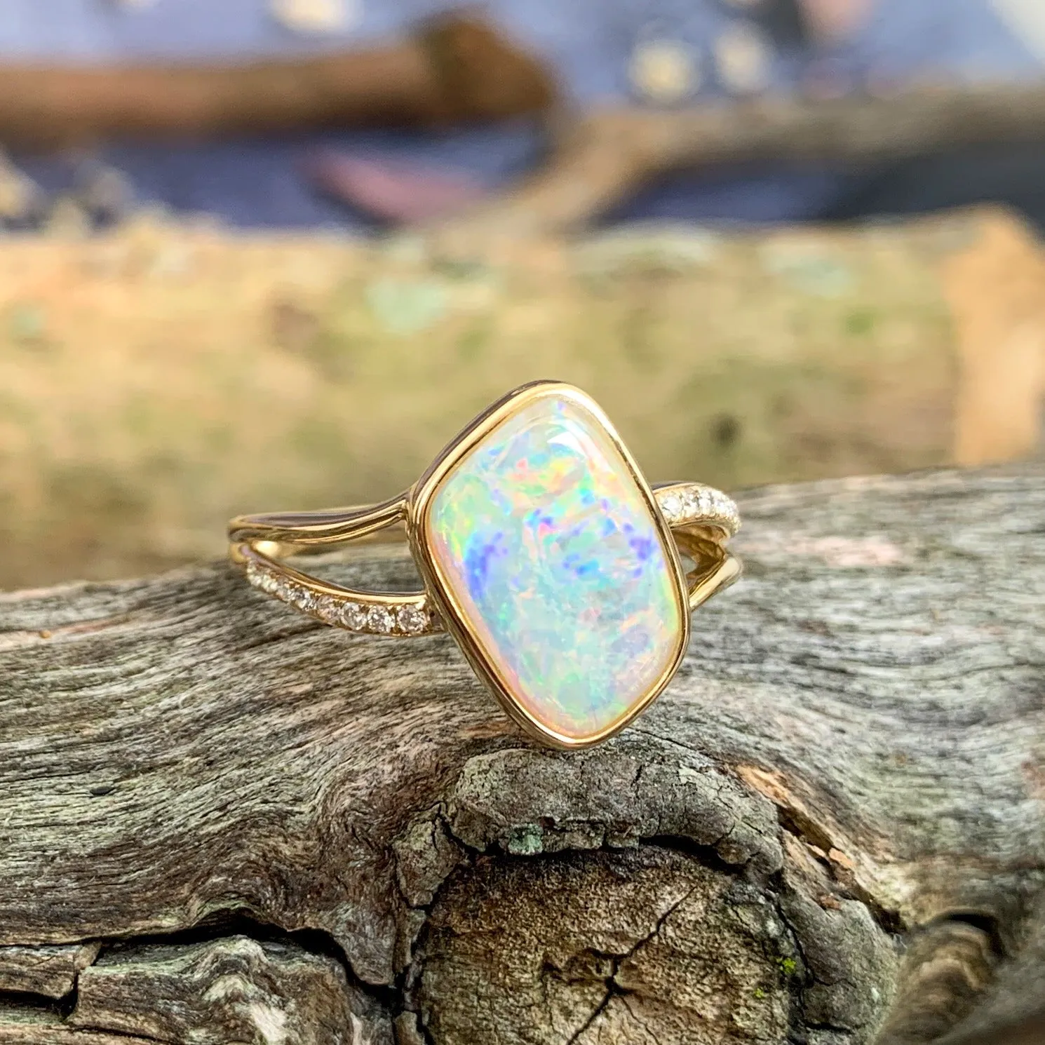 14kt Yellow Gold wave split shank White Opal ring