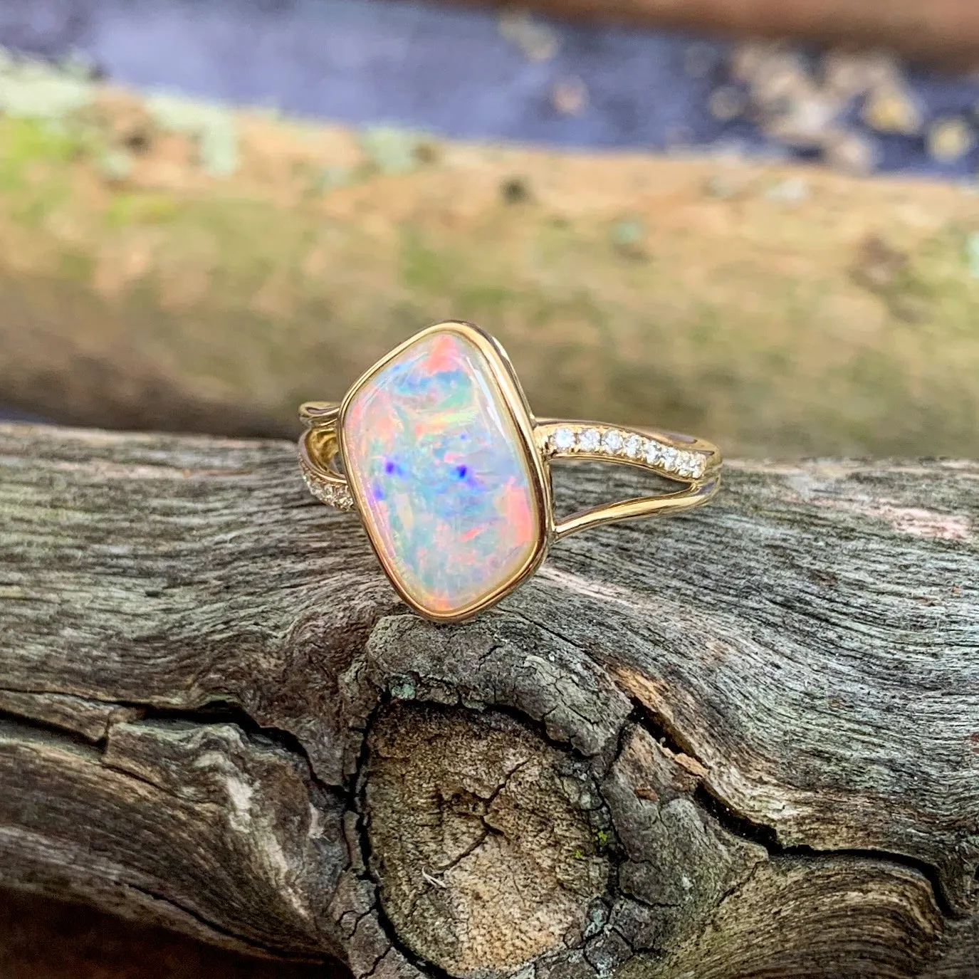 14kt Yellow Gold wave split shank White Opal ring