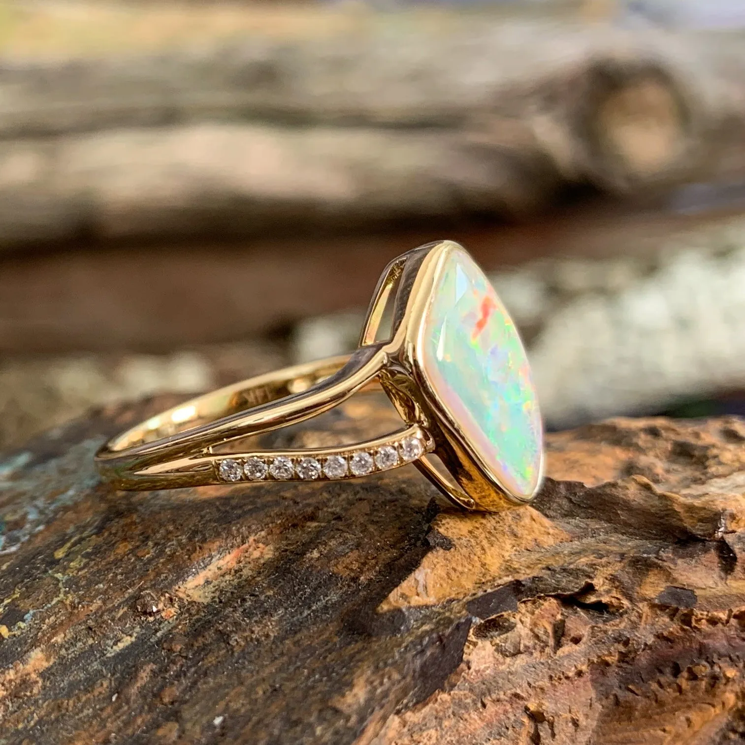 14kt Yellow Gold wave split shank White Opal ring