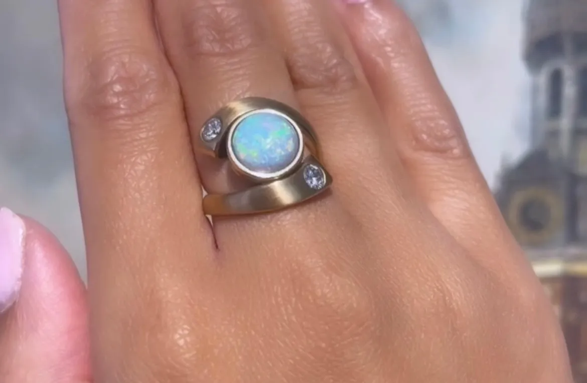 Opal and diamond ring in 14 carat matt gold