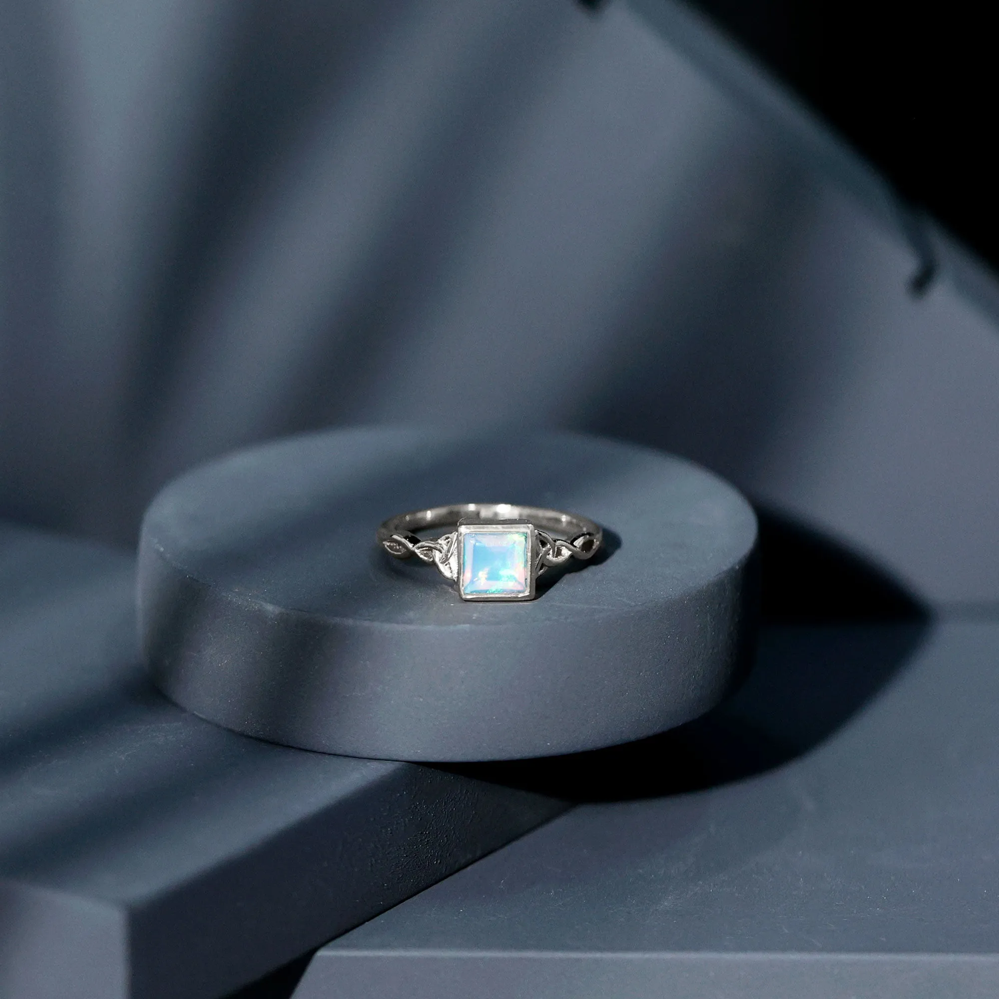 Princess Cut Ethiopian Opal Celtic Solitaire Ring in Bezel Setting